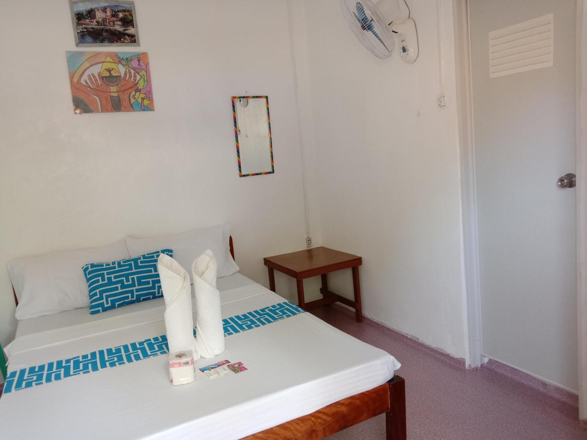 Bucana Beachfront Guesthouse El Nido Habitación foto