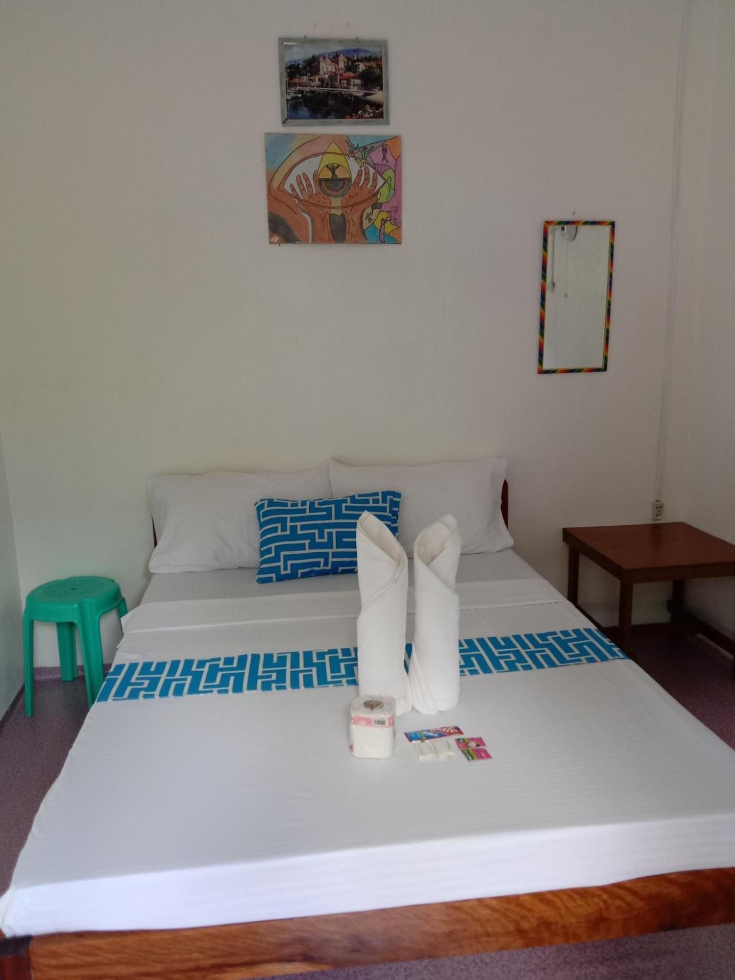 Bucana Beachfront Guesthouse El Nido Habitación foto